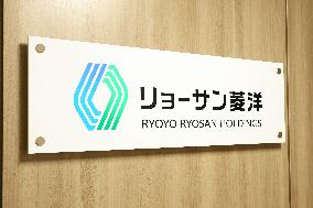 Ryosan Ryoyo Holdings signboard and logo